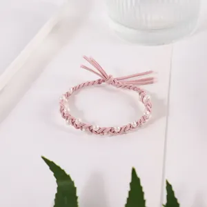 Korean style pink braided hair rope with pearl decorations and bow, elegant and sweet.