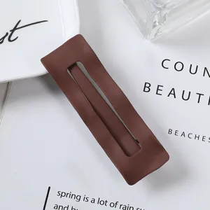 Brown matte geometric hair clip, minimalist cutout metal barrette for daily women hair styling.