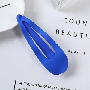 Klein Blue waterdrop hair clip for women, stylish minimalist metal duckbill hairpin accessory.