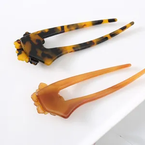 Acetate U-shaped hair fork detail, vintage floral design hair stick for elegant buns.