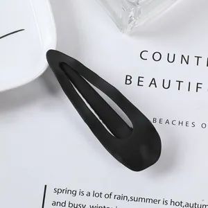 Matte black waterdrop hair clip detail, minimalist hairpin for daily styling and elegant chic look.