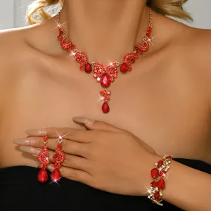 Set di gioielli con collana orecchini e bracciale in cristallo rosso per matrimoni ed eventi.