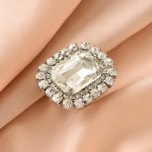 Stunning crystal ring feature large square stone and halo rhinestones on elegant satin fabric.