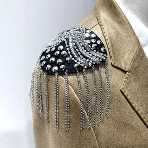 Handmade tassel shoulder epaulet with sparkling rhinestones and metal rivets for stage outfits.