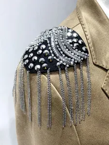 Handmade metal tassel epaulets with rhinestones and studs, ideal for stage costumes and jacket decor.