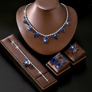 Set da sposa quattro pezzi con collana orecchini bracciale anello in zircone blu.