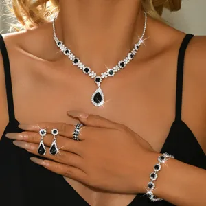 Elegant silver black gemstone jewelry set necklace earrings bracelet ring bridal party.