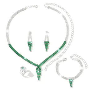 Conjunto joyas circonita verde collar pendientes anillo pulsera detalle lujo.
