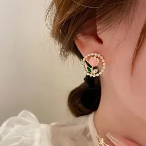 Chic tulip pearl stud earrings for women, sweet floral design, elegant daily jewelry style.