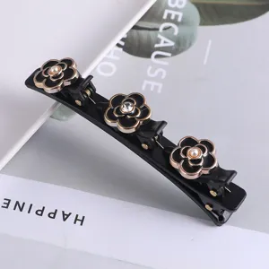 Zwarte meerlaagse haarspeld met elegante bloemen en strass steentjes voor vrouwen.