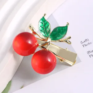 Cute red cherry metal hair clip with green enamel leaves, sweet fashion hair accessory for girls.