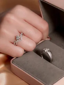 Exquisite moissanite couple rings set featuring dazzling stones for weddings and proposals.