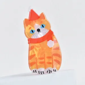 Cute Christmas orange cat acrylic hair claw clip, creative holiday hair accessory for women.
