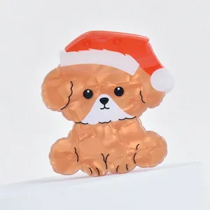 Close-up detail view of the cute Christmas puppy acrylic hair claw clip, glossy finish, festive.