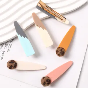Cute resin hair clips set with fuzzy pom-pom and color-block design for daily sweet hair styling.