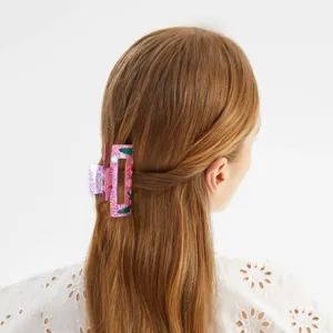 Pink glitter Christmas hair claw clip with tree and candy pattern for women daily holiday wear.
