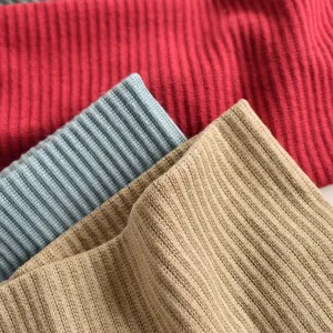 Close-up detail of ribbed knit sports headband fabric showing texture and elastic quality.