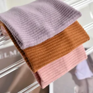 Solid color knitted yoga headband, high elasticity wide brim hair band, retro sports style detail.