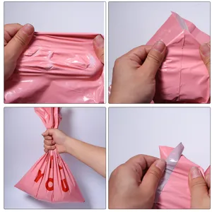 Verstärkte rosa PE Versandtaschen mit starkem Klebestreifen, wasserdichte Verpackungsbeutel.