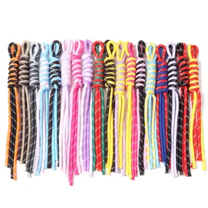 Colorful nylon braided lanyards detail closeup, DIY keychain and phone strap cord accessories.