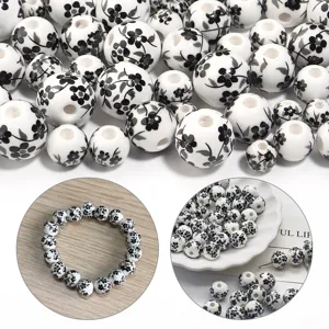 Perline in ceramica floreale bianco e nero per bracciali artigianali fai da te e gioielli.