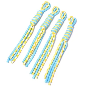 Detail shot of handcrafted blue and yellow nylon braided keychain lanyards for DIY phone accessories.