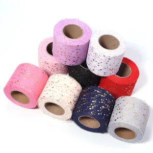 Colorful gold star tulle fabric rolls for DIY craft, wedding dress, and party decoration.