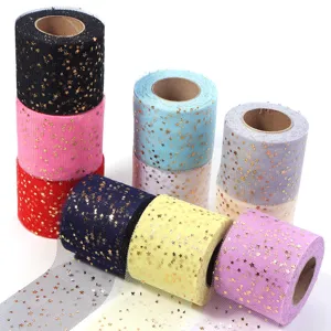 Colorful tulle fabric rolls with gold foil stars, ideal for DIY crafts and party decor.