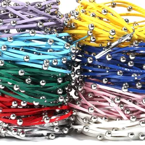 Colorful beaded leather cord bundles for DIY punk necklaces, waist chains, and clothing accessories.