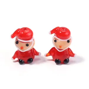 Handcrafted red glass Santa Claus beads for DIY jewelry making, charm bracelets, and holiday party decor.