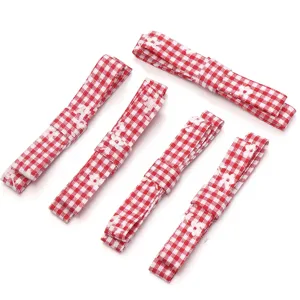 Red and white plaid ribbon straps for DIY hair clips, clothing accessories, and doll decoration.