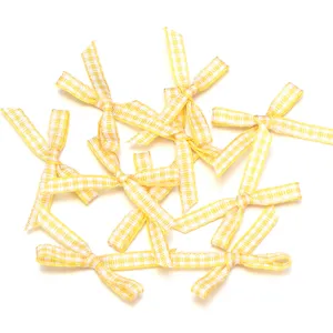 Fiocchi in nastro a quadri gialli, perfetti per fai da te, abbigliamento e confezioni regalo.