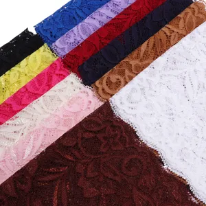 Detailed view of colorful elastic lace fabric trims, perfect for garment sewing and crafts.
