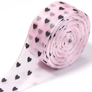 Nastro trasparente rosa con stampa di cuori neri dettaglio per bricolage e regali fai da te