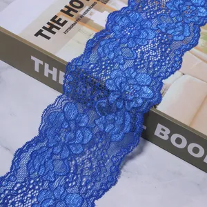 Detailed blue floral lace trim ribbon for DIY sewing, clothing garments, and lingerie crafts.
