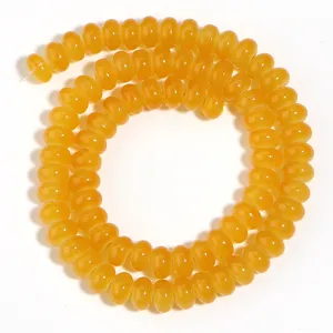 Hilo de cuentas de abaco de vidrio amarillo accesorio artesanal de joyeria DIY detalle.