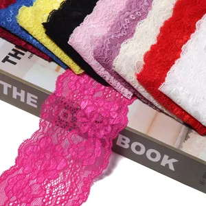 Colorful elastic lace trimming fabric detail, perfect for DIY sewing and clothing crafts.