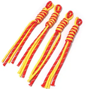 Handcrafted nylon rope phone lanyard detail, red and yellow color-blocking keychain charm.