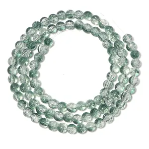 Close-up detail of the green crackle glass round beads, perfect for DIY jewelry making and crafting.