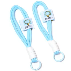 Light blue woven lanyard detail, polyester braided phone charm wrist strap for accessories.