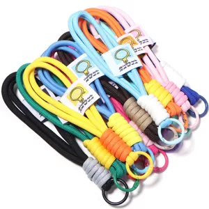 Colorful braided polyester keychain lanyard and mobile phone strap accessory detail shot.