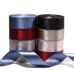 Double-sided shimmering ribbon rolls for gift wrapping, bow making, and DIY crafts.