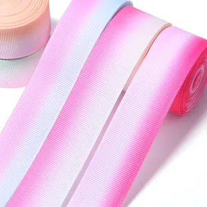 Gradient grosgrain ribbon detailed view showing ribbed texture and beautiful color transitions for DIY crafts.