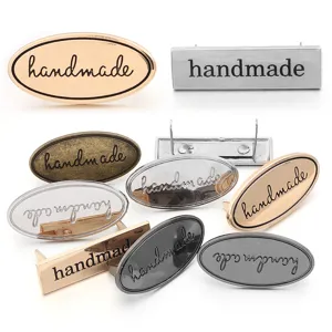 Metal handmade tags for DIY bags and clothing, available in multi colors and shapes, durable.