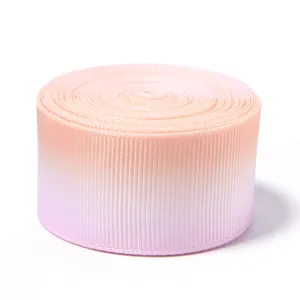 Gradient grosgrain ribbon roll, perfect for DIY hair bows, gift wrapping, and party decor.