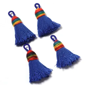 Blue tassel charms with colorful wrap, bright silk cotton thread for DIY jewelry and crafts.