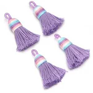 Detail view of gradient shiny cotton tassels, ideal for DIY handmade jewelry and craft projects.