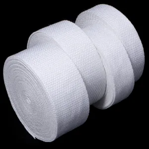 Thickened white polyester cotton webbing roll for bag straps and garment accessories sewing.