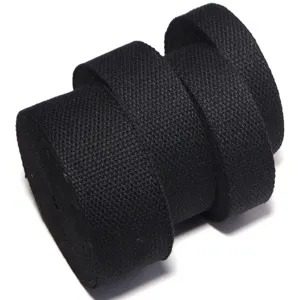 Thick poly-cotton black webbing strap rolls for canvas bags, luggage belts, and clothing accessories.