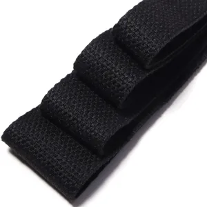 Close-up detail of black thick textured cotton-polyester webbing fabric for garment sewing.